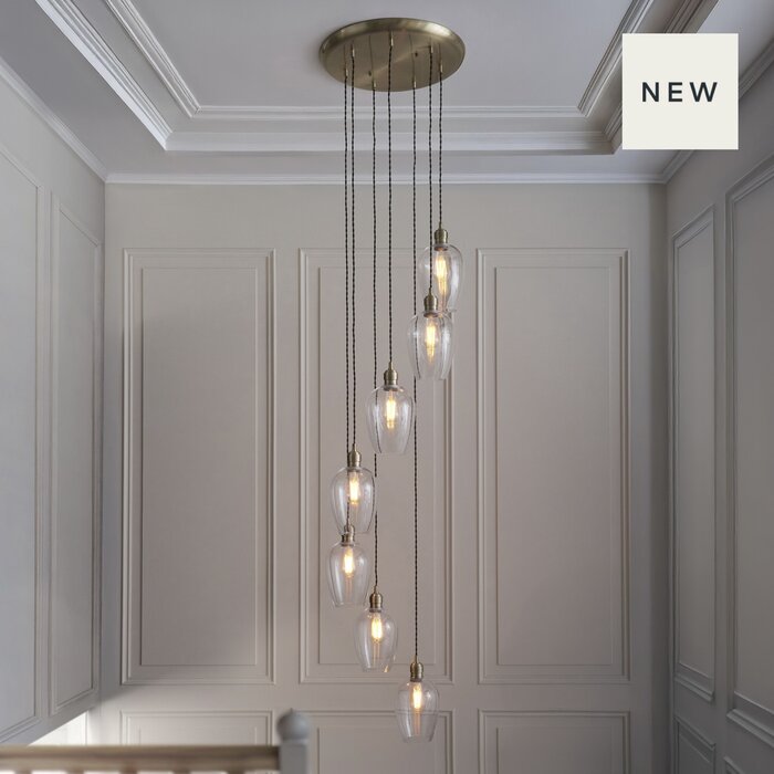 Una - Staircase Light - 7 Light Cascading Pendant - Antique Brass